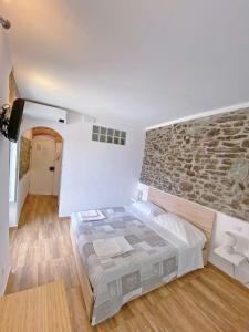 Postel nebo postele na pokoji v ubytování Double room "Malvasia" - Casedirio