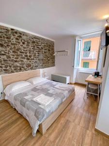 Postel nebo postele na pokoji v ubytování Double room "Malvasia" - Casedirio