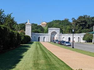 a white building with cars parked in front of it at Capitol Hill Adjacent Home Steps to Park and River in Washington