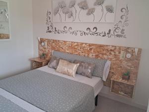 Posteľ alebo postele v izbe v ubytovaní CASA MARIA CINTA + 8 fotografií