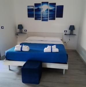 Postel nebo postele na pokoji v ubytování B&B Ospedale Pescara