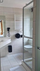 Ванна кімната в Hotel L'ermitage