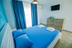 Postel nebo postele na pokoji v ubytování Casa Mavi