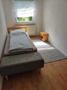 Säng eller sängar i ett rum på Ferienhaus Jung