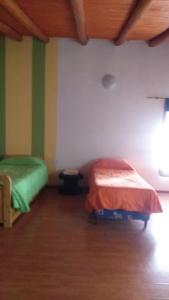 A bed or beds in a room at Lo de Tere P/8!