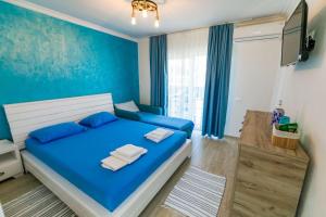 Postel nebo postele na pokoji v ubytování Casa Mavi