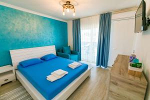 Postel nebo postele na pokoji v ubytování Casa Mavi