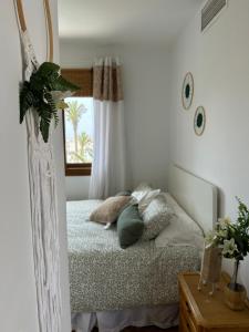 a bedroom with a bed and a window at VILLA CALMA en Teguise, "Pueblo con Encanto" in Teguise +85 photos