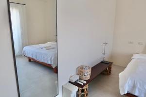 Postel nebo postele na pokoji v ubytování SUNME Inn