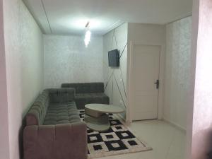 Prostor za sedenje u objektu Appartement Meublé ALHADIKA