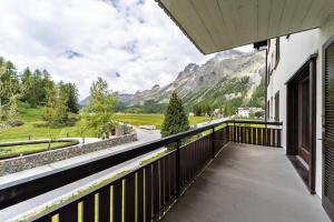 a balcony with a view of a mountain at Chesa Muot Marias - Sils in Sils Maria