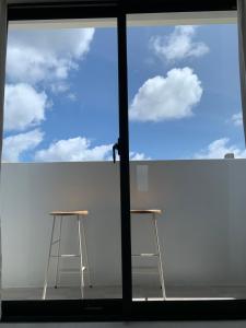 Balkón nebo terasa v ubytování SUNME Inn