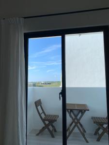 Balkón nebo terasa v ubytování SUNME Inn
