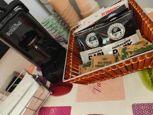 a table with a basket of products on it at Camere Rufino A POCHI CHILOMETRI DAL CENTRO DI PERUGIA E DA ASSISI in Collestrada
