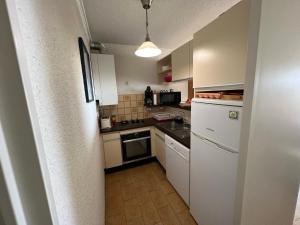 Köök või kööginurk majutusasutuses appartement vue mer à la plage