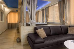 Posezení v ubytování Hotel Maksim
