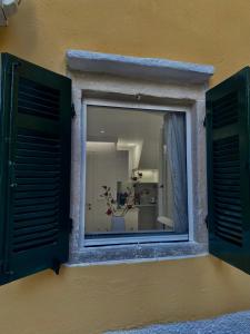 Kuchyň nebo kuchyňský kout v ubytování Corfu Port Art Studios
