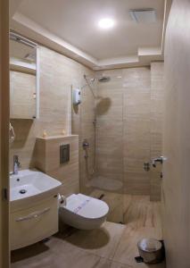 Koupelna v ubytování Hotel Maksim