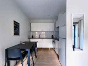 Η κουζίνα ή μικρή κουζίνα στο Casas S. Dinis