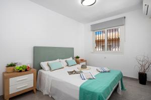 Katil atau katil-katil dalam bilik di Casa Estaca, Playa Flamenca - Beach and fantastic weather +23 gambar