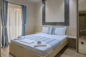 Postel nebo postele na pokoji v ubytování Hotel Maksim