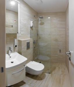 Koupelna v ubytování Hotel Maksim