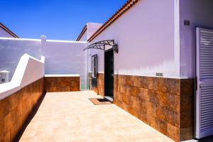 a view from the outside of a house with a door at La Casita del Sur, Abades in Abades