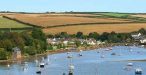an aerial view of a harbor with boats in the water at Cottage in Frogmore near Salcombe Estuary & Beaches in Kingsbridge