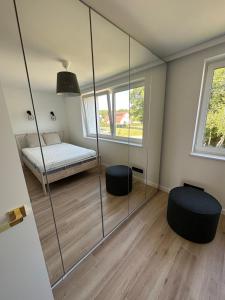Postel nebo postele na pokoji v ubytování Apartament Michałek