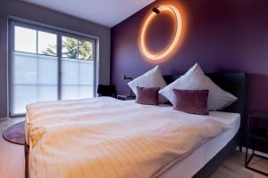 Postel nebo postele na pokoji v ubytování Patentkrug Design Hotel