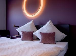 Postel nebo postele na pokoji v ubytování Patentkrug Design Hotel