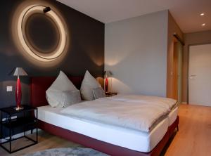 Postel nebo postele na pokoji v ubytování Patentkrug Design Hotel
