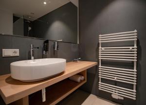 Koupelna v ubytování Patentkrug Design Hotel + 18 fotografií