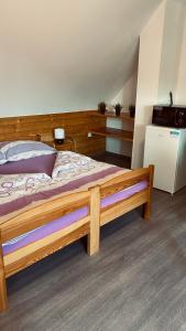 Postel nebo postele na pokoji v ubytování Horské Apartmány Smrčina