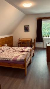 Postel nebo postele na pokoji v ubytování Horské Apartmány Smrčina + 37 fotografií