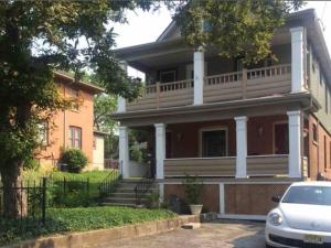 a house with a car parked in front of it at Adorable 2-bedroom unit with jacuzzi beside falls in Niagara Falls +10 photos