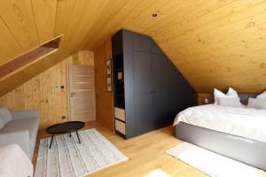 Postel nebo postele na pokoji v ubytování CHALET COBURG