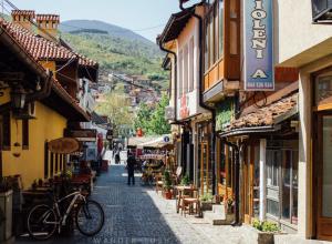 a cobblestone street in a town with buildings at APARTMENT Ortakoll prizren 2 bedroom in Prizren