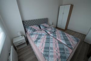 Postel nebo postele na pokoji v ubytování Petković apartmani 48