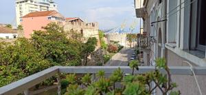 a view of a street from a balcony of a building at Lukas Apartament Vollga Durres in Durrës