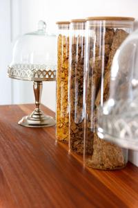 a close up of a table with a glass container of food at Cradock Guest House in Cradock