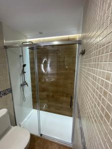 Et badeværelse på Finisterre Fisterra apartamento en la playa