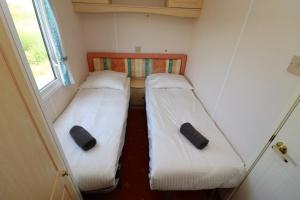 Posteľ alebo postele v izbe v ubytovaní De Zuidvliet Chalet 4