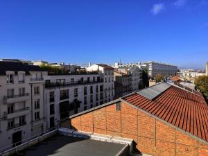 a view from the roof of a building at Spacious Apartment near Paris, for Family and Friends in Montrouge