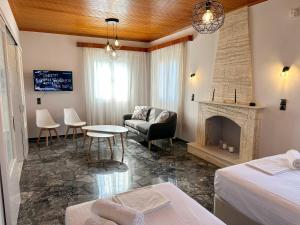 Postel nebo postele na pokoji v ubytování Magdalini House