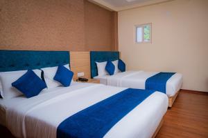Majestic Lake Front Hotel & Suites 객실 침대