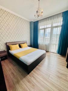 Ένα ή περισσότερα κρεβάτια σε δωμάτιο στο Lina’s seaside apartments +46 φωτογραφίες