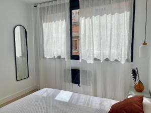 Posteľ alebo postele v izbe v ubytovaní AM I Segovia VUT