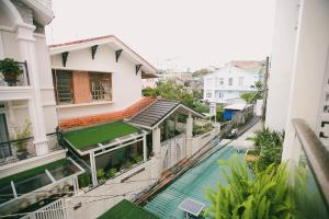 a view from the balcony of a house with a swimming pool at Da Lat Apartments in Da Lat