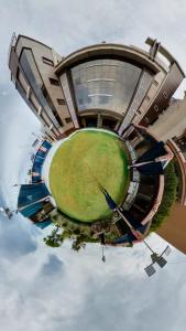 Изглед към басейн в Hotel Govindam Elite или наблизо